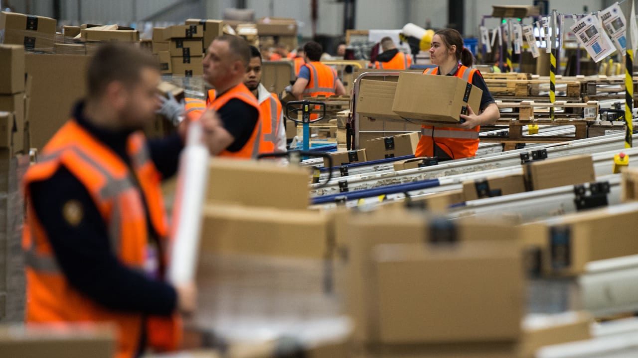 Click to enlarge Amazon warehouse workers