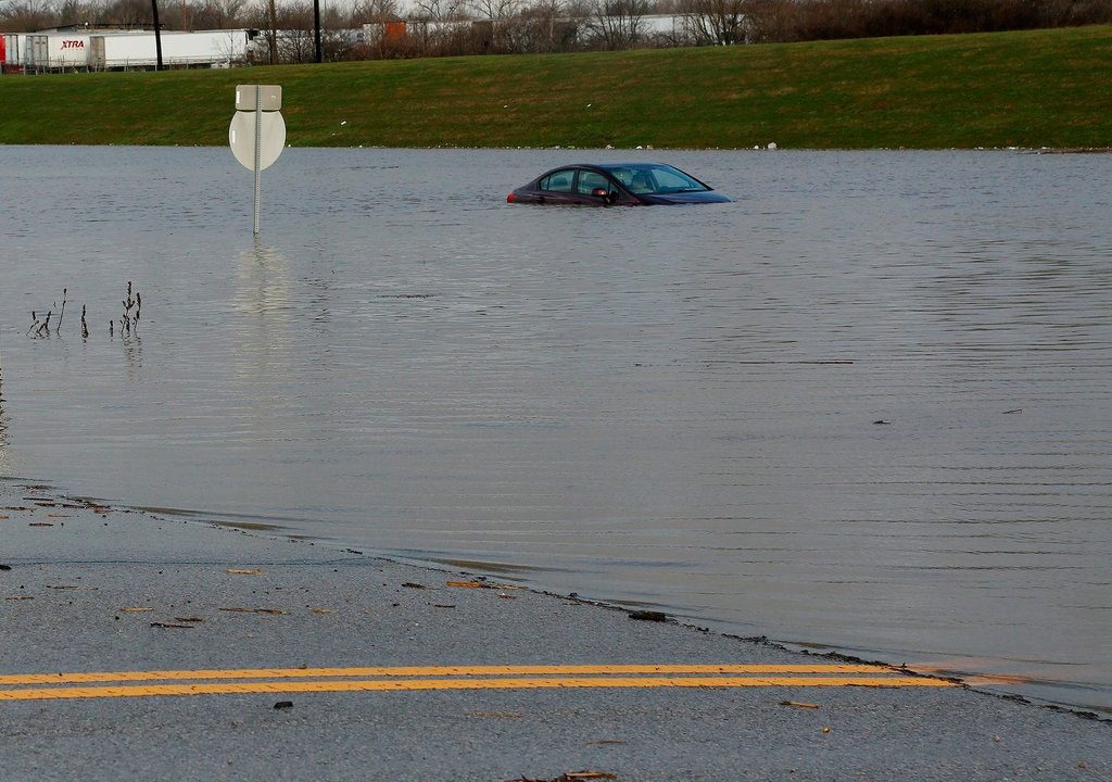 Floodwaters in Galloway, Ohio, on Friday.Credit...