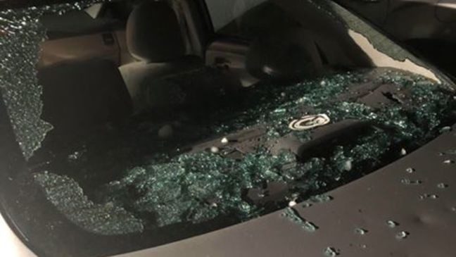 Click to enlarge Hail shatters a windshield in Holts Summit Friday night
