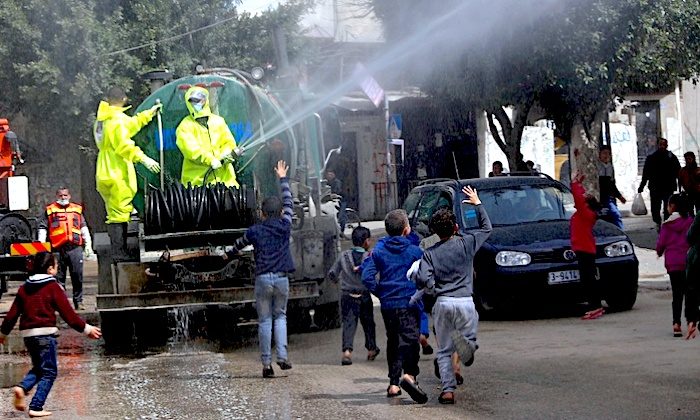 Click to enlarge Spraying street
