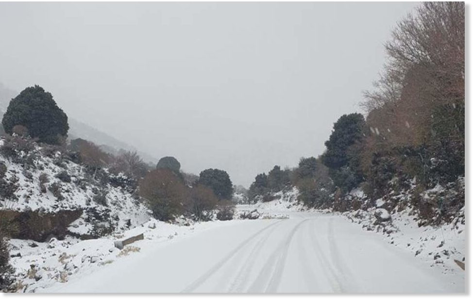Heavy April snowfall closes roads on Mount Hortiatis in Greece foot