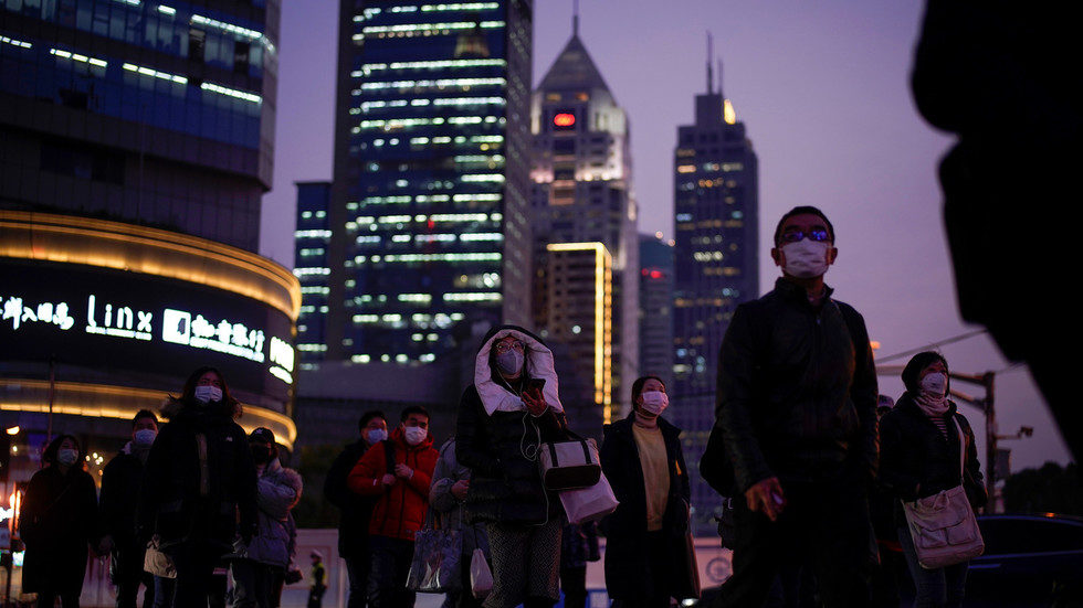 Click to enlarge Masked people in Shanghai