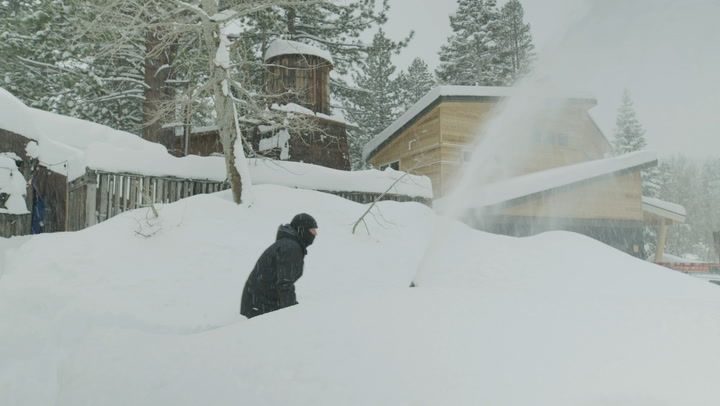 Heavy snow buries empty ski resort