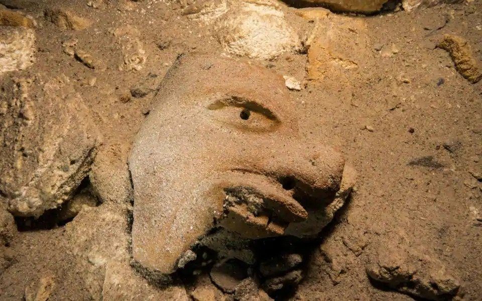 Click to enlarge underwater cave mexico mayan mask