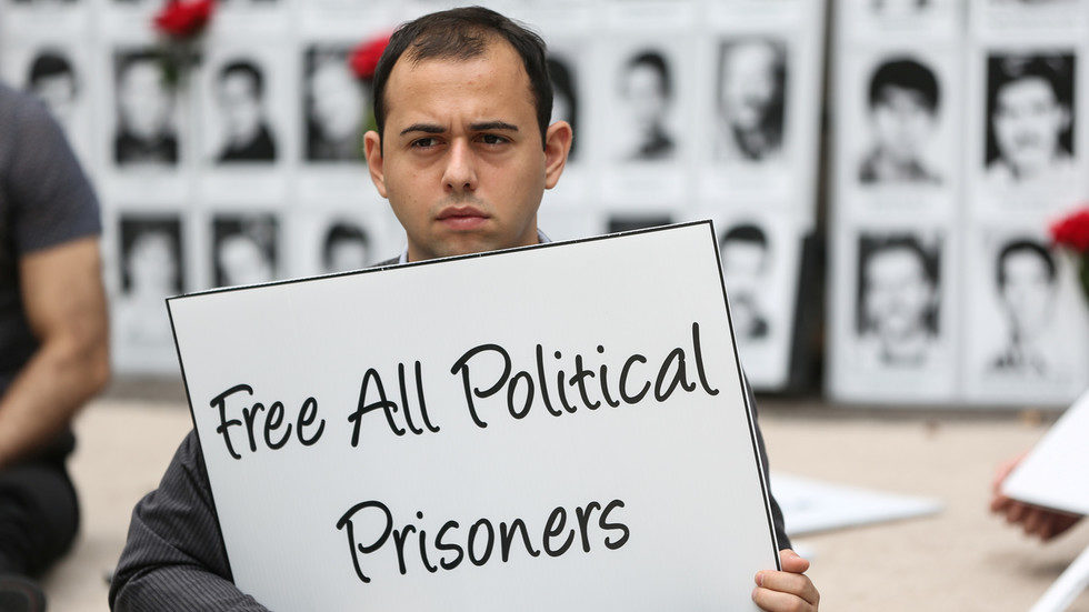 Click to enlarge protest free political prisoners