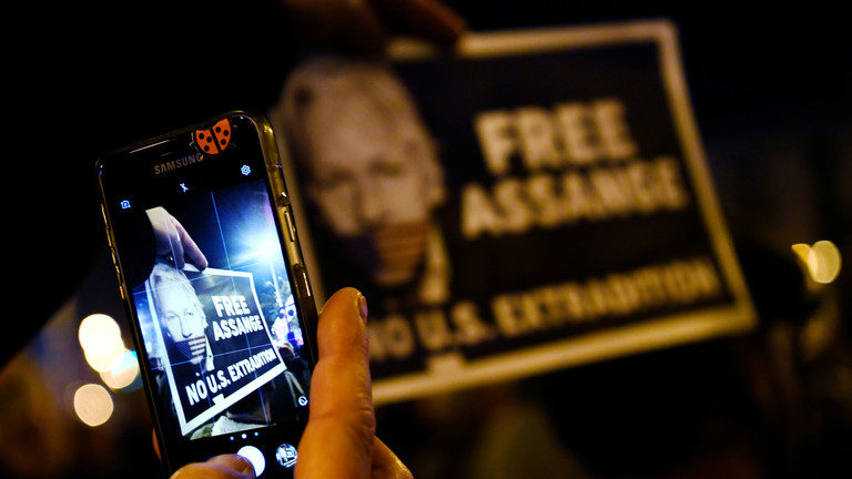 Click to enlarge Assange