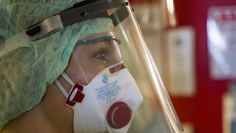 Click to enlarge nurse with face mask