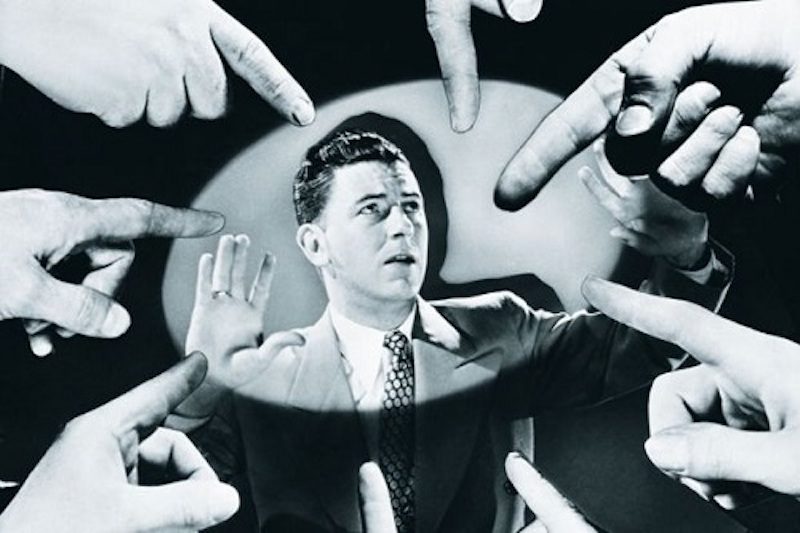 Click to enlarge hands point to man