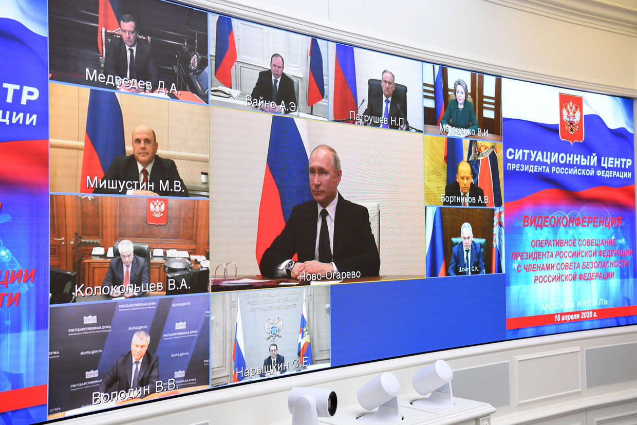 Click to enlarge Putin chairs a remote meeting