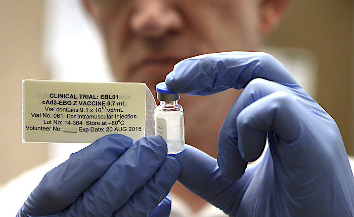 Click to enlarge blue hands vaccine