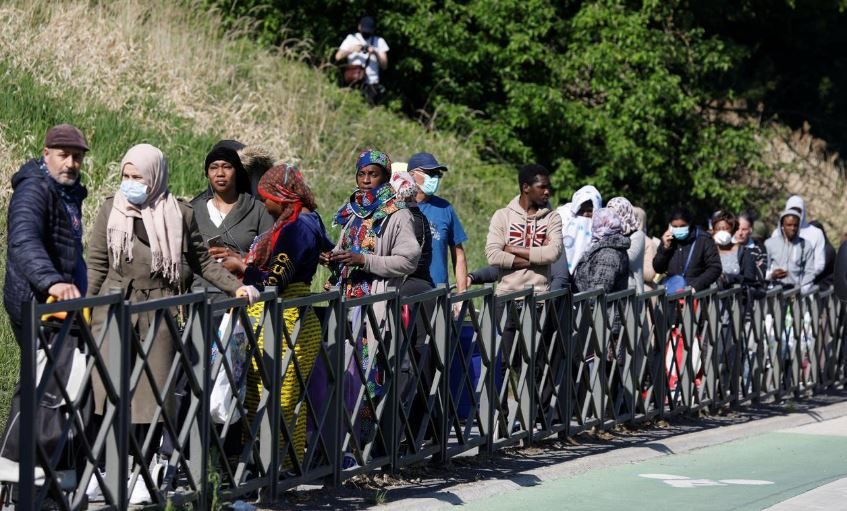 Food bank line in Clichy-sous-Bois, France