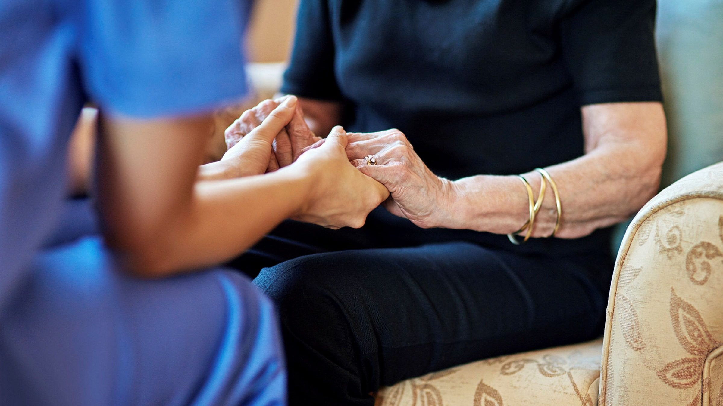 Click to enlarge Elderly woman and carer