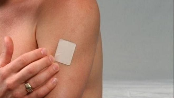 Man using nicotine patch