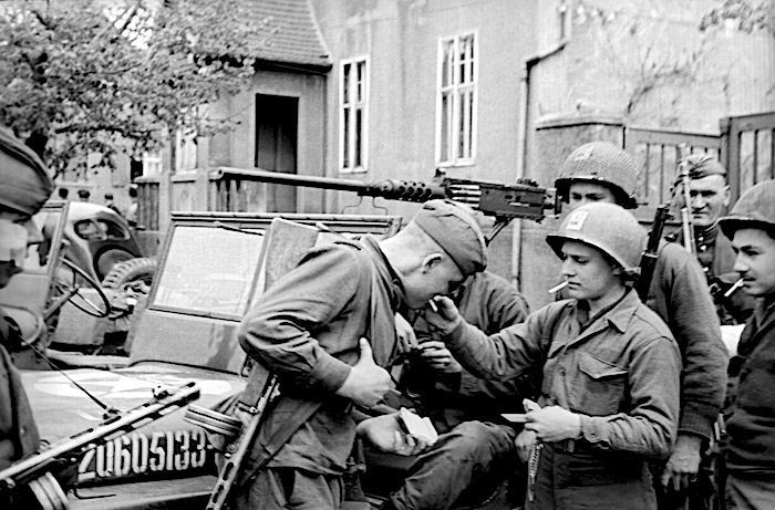 Click to enlarge Sharing cigarettes