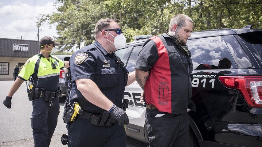 Click to enlarge apex tattoo owner arrested