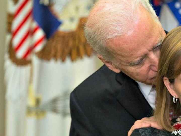 biden sniffing hair