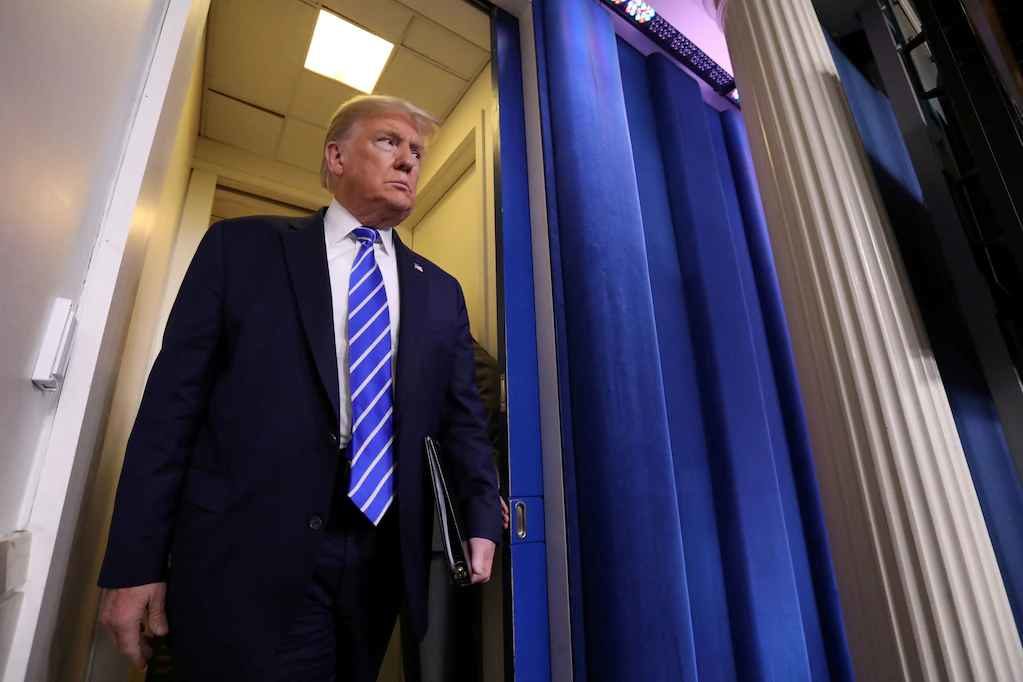 Click to enlarge Trump enters briefing