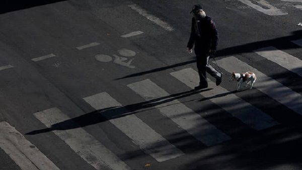 Click to enlarge Man walking alone with his dog