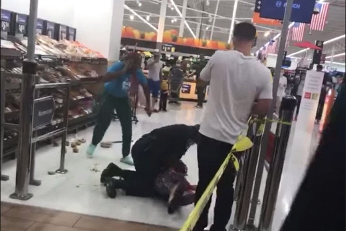 Click to enlarge Cop body slams Walmart customer