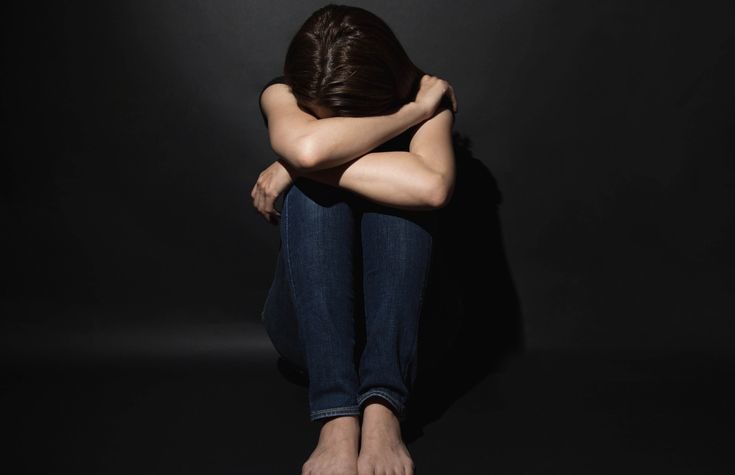 Click to enlarge woman depressed, hiding