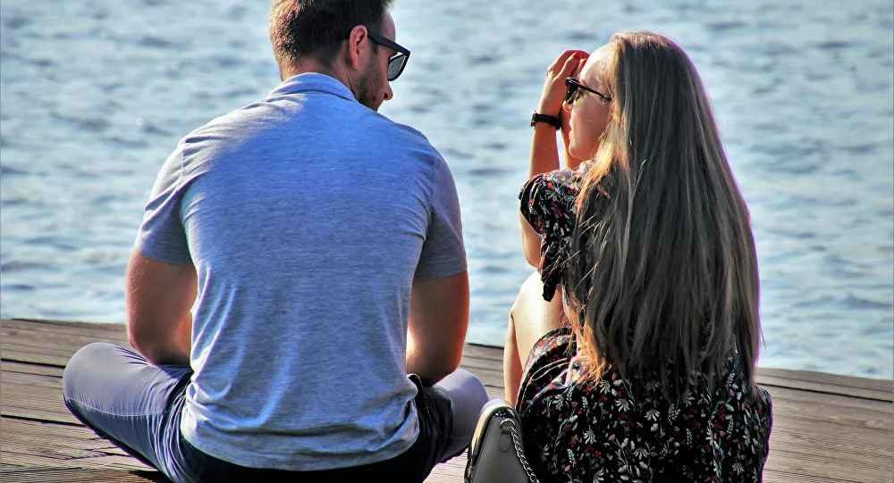 couple sitting dock