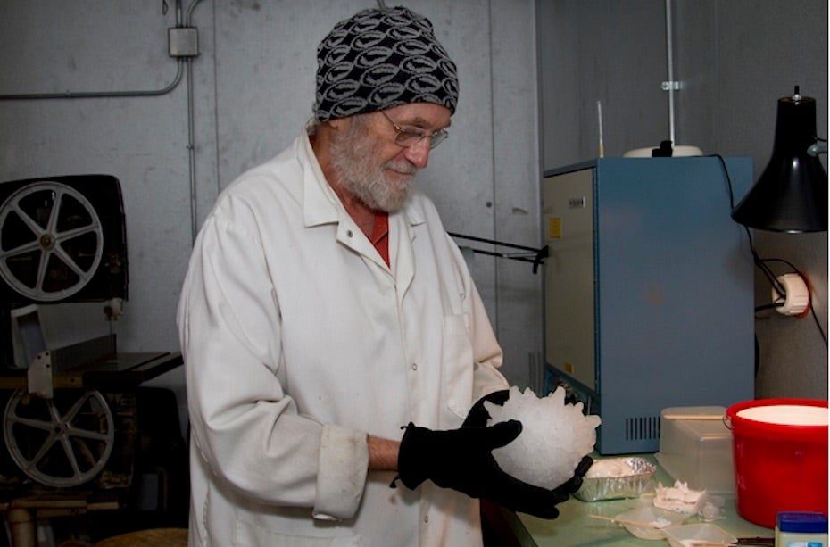 Click to enlarge NCAR scientist Charles Knight prepares to make