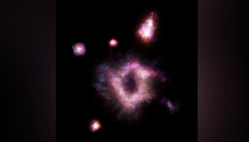 Click to enlarge donut shaped galaxy