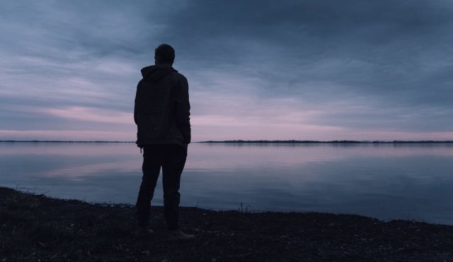 Click to enlarge Man standing alone