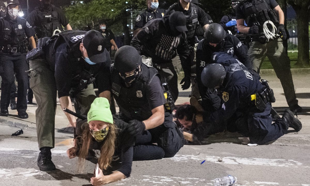 Click to enlarge police and protesters