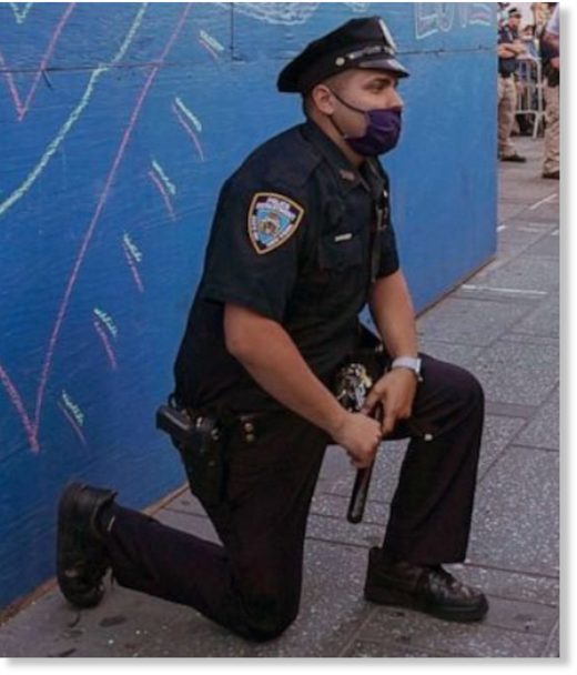 Click to enlarge kneeling cop