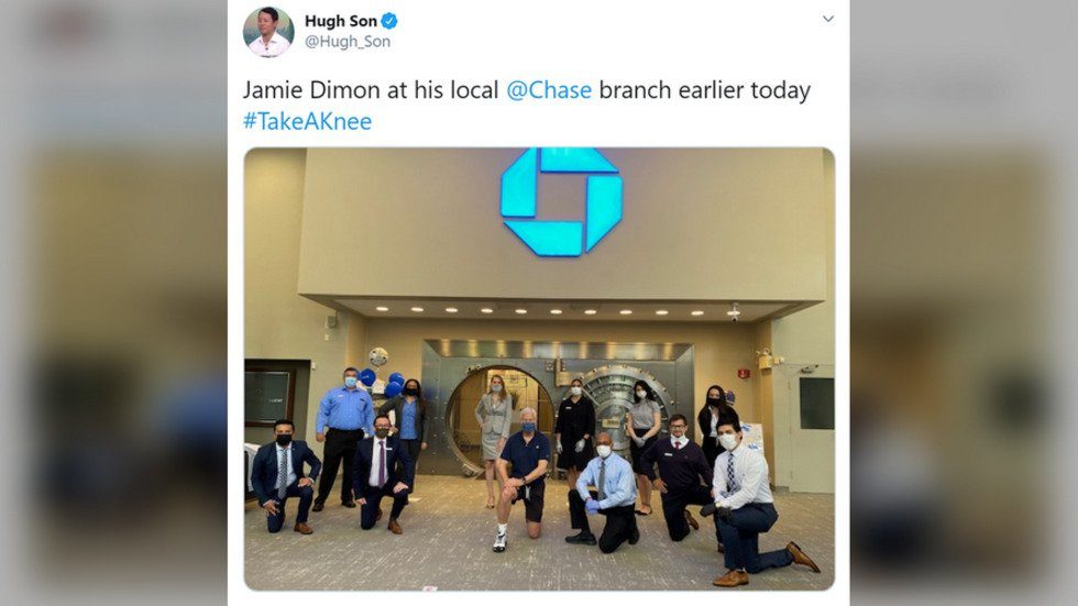 Click to enlarge jamie dimon kneeling