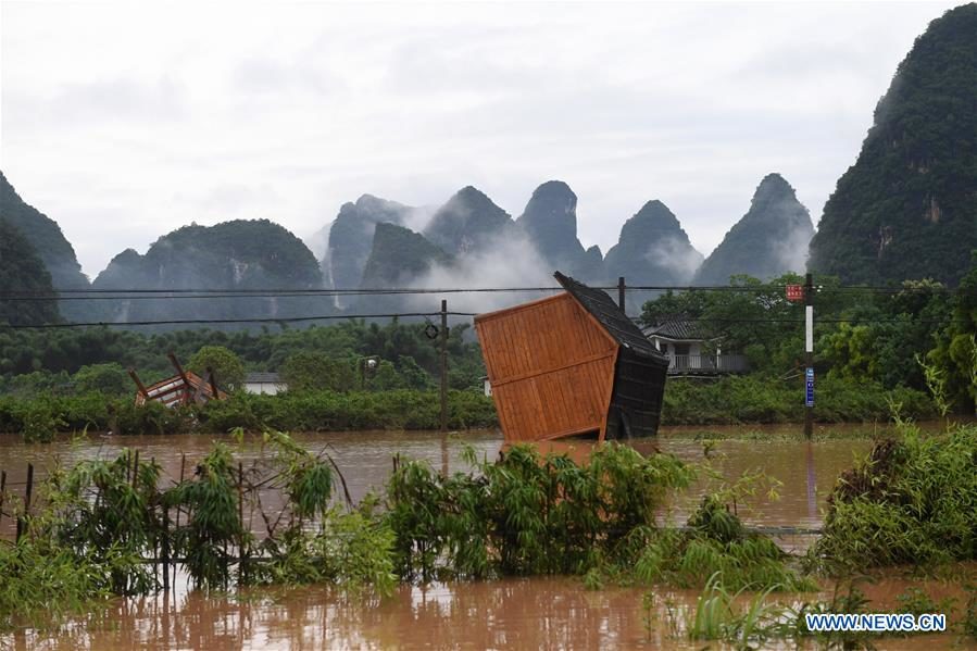 Click to enlarge Photo taken on June 7, 2020 shows tourism facilities damaged by flood caused by downpour in Yangshuo of Guilin, south China's Guangxi Zhuang Autonomous Region.