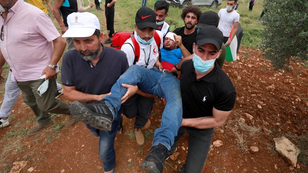 Click to enlarge wounded palestinian west bank