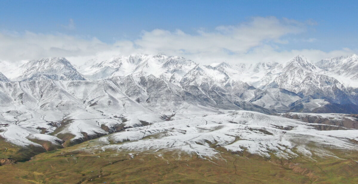The Qilian Mountains after the snow that fell late on June 7, 2020.