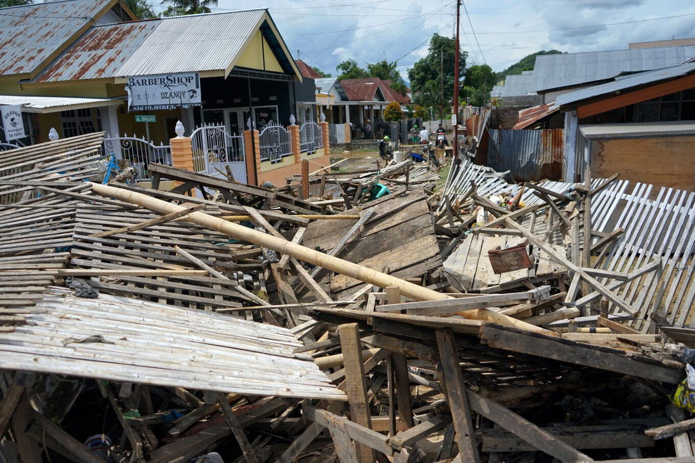 Debris litters Bugis subdistrict in Gorontalo city after a flash flood on Friday.