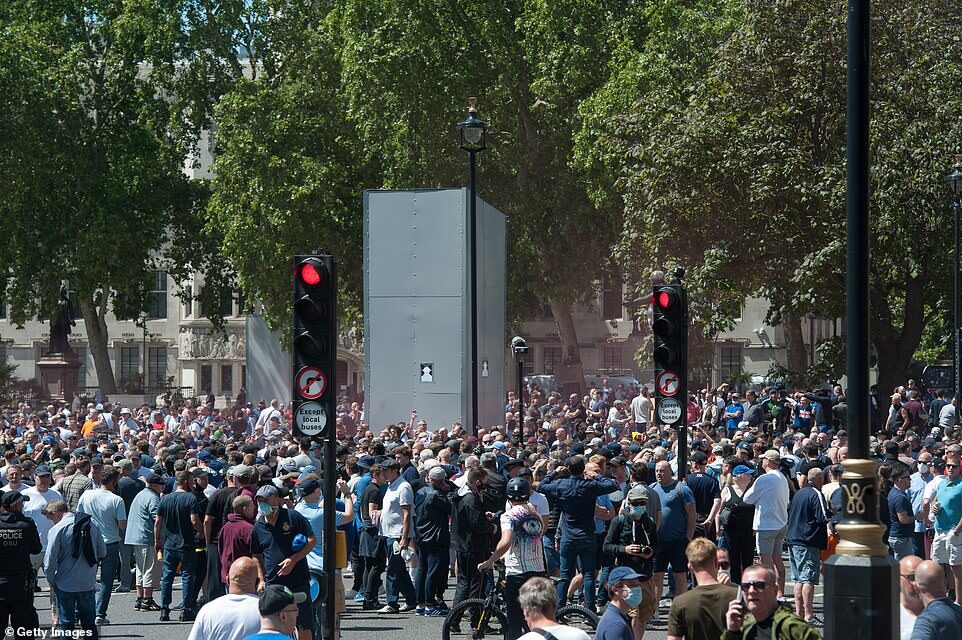 Click to enlarge Churchill statue boarded up London June 2020