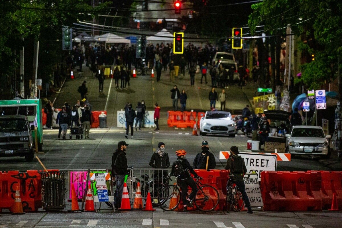 Click to enlarge CHAZ street barriers