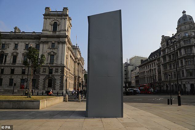 Click to enlarge boarding up of Winston Churchill's statue