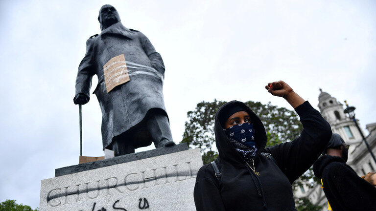 vandalised statue of Winston Churchill