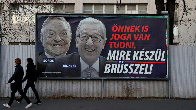 juncker billboard soros