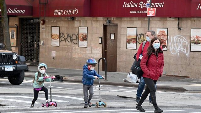 family wearing masks