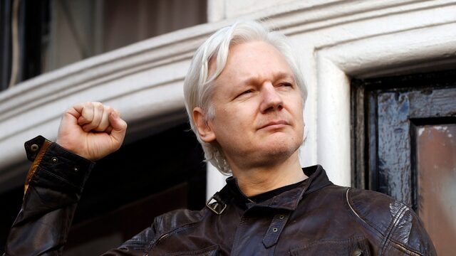 Click to enlarge Assange