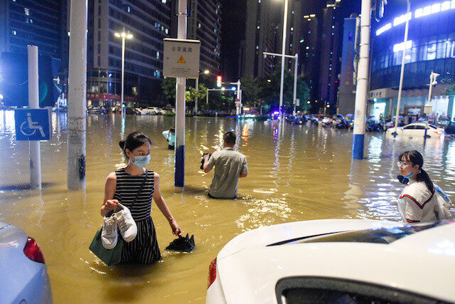 More Chinese regions brace for floods as storms shift east