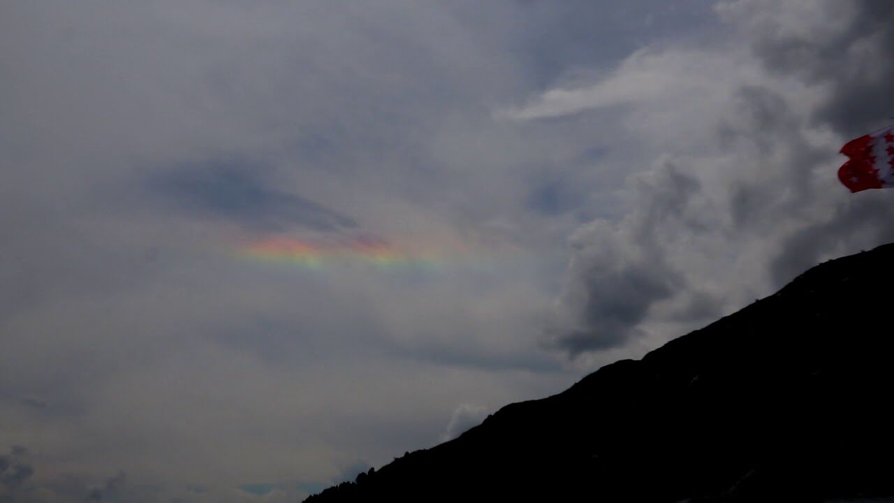 CZ and sun halo over Swiss Alps