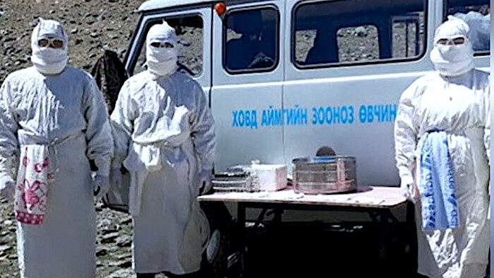 Click to enlarge 3 gowned medics