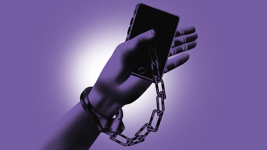 Click to enlarge phone handcuffed to arm