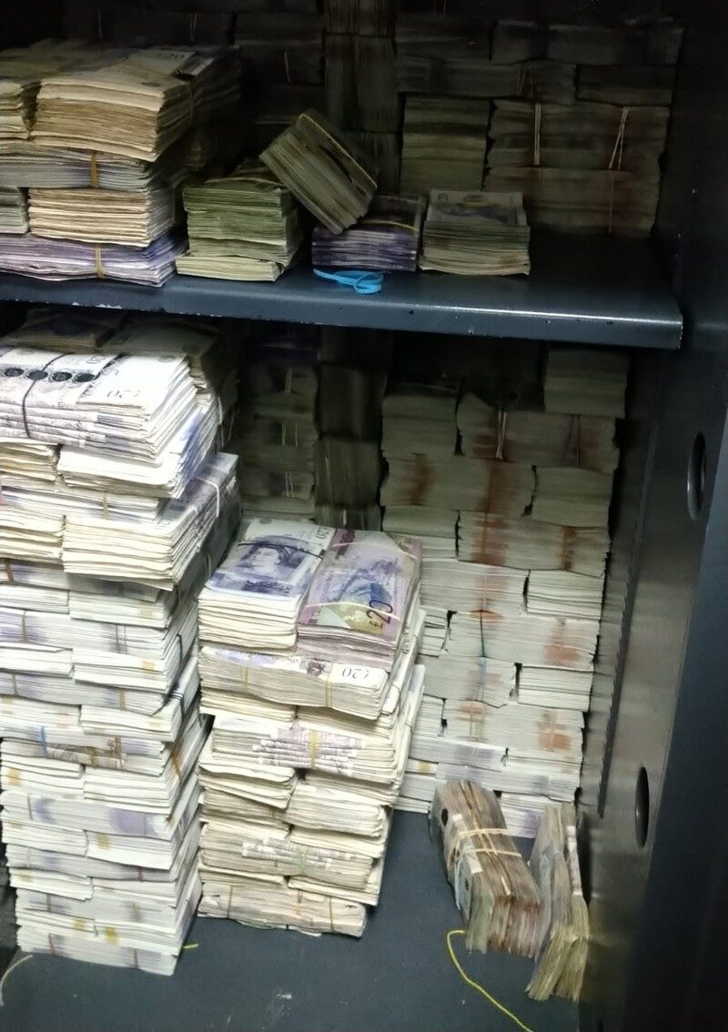 Click to enlarge cash seized by law enforcement
