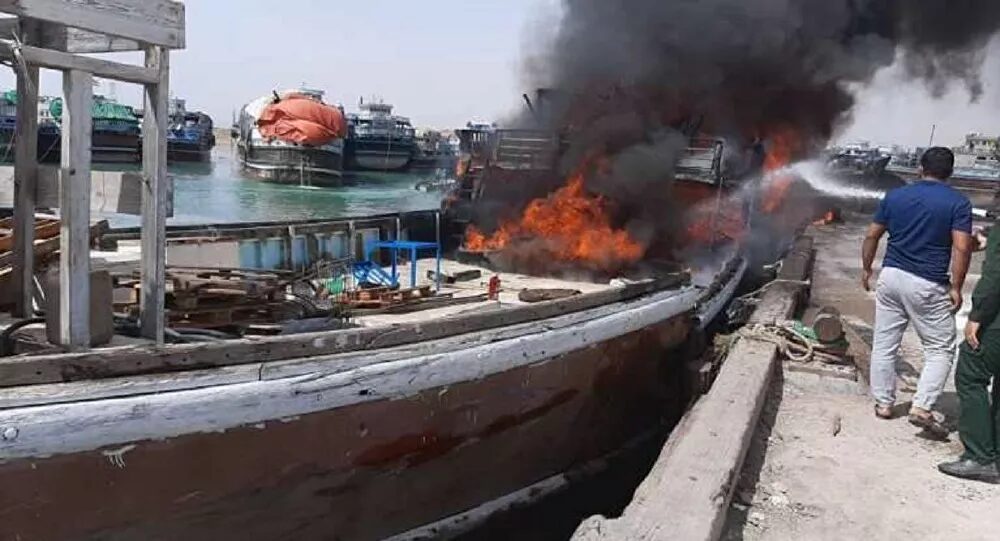 container ship catches fire
