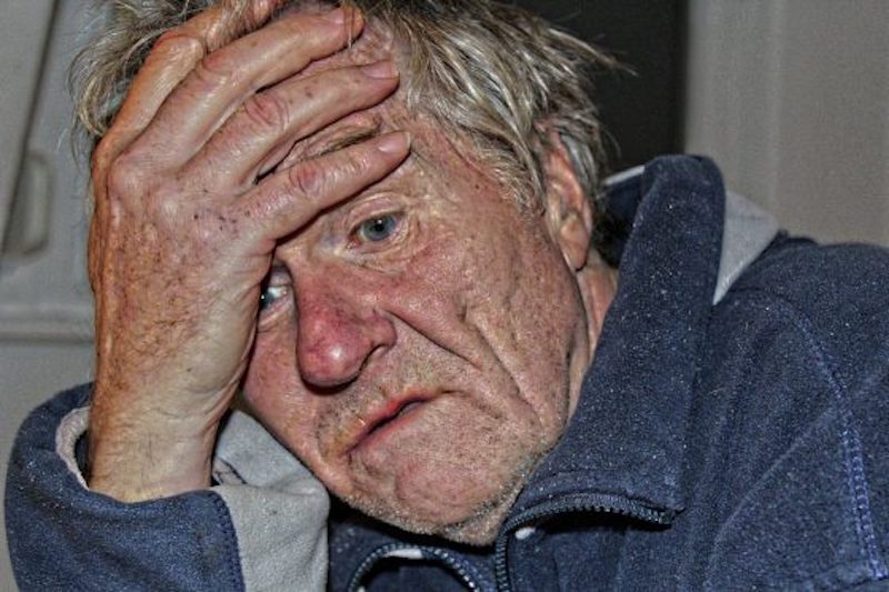 Click to enlarge despondent man