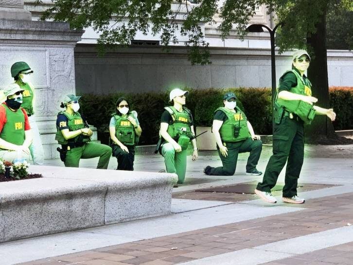 Click to enlarge FBI personnel